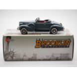 A BROOKLIN BRK.178 hand built white metal, 1:43 scale model of a 1937 Oldsmobile L-37 convertible,