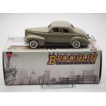 A BROOKLIN BRK.204 hand built white metal, 1:43 scale model of a 1939 Nash Ambassador Eight coupe,