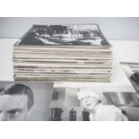 A large quantity of mixed black/white film stills - circa 300+