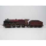 A kitbuilt finescale O gauge 2-rail 12V DC Royal Scot class steam locomotive in LMS maroon livery,