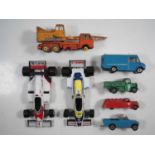 A small group of playworn diecast by DINKY and SPOT-ON together with a pair of larger scale