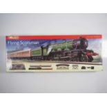 A HORNBY R1072 OO gauge Flying Scotsman train set, missing mains transformer and Trakmat but