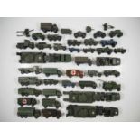 A large group of playworn DINKY military vehicles to include DINKY Toys No 162a, 621, 622, 623, 641,