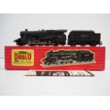 A HORNBY DUBLO 2224 OO gauge class 8F steam locomotive in BR black numbered 48073 - VG in VG box