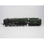 A kitbuilt finescale O gauge 2-rail 12V DC class 9F steam locomotive in BR green livery, numbered