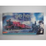 A HORNBY R1053 OO gauge Harry Potter & the Prisoner of Azkaban train set, appears compete - VG in
