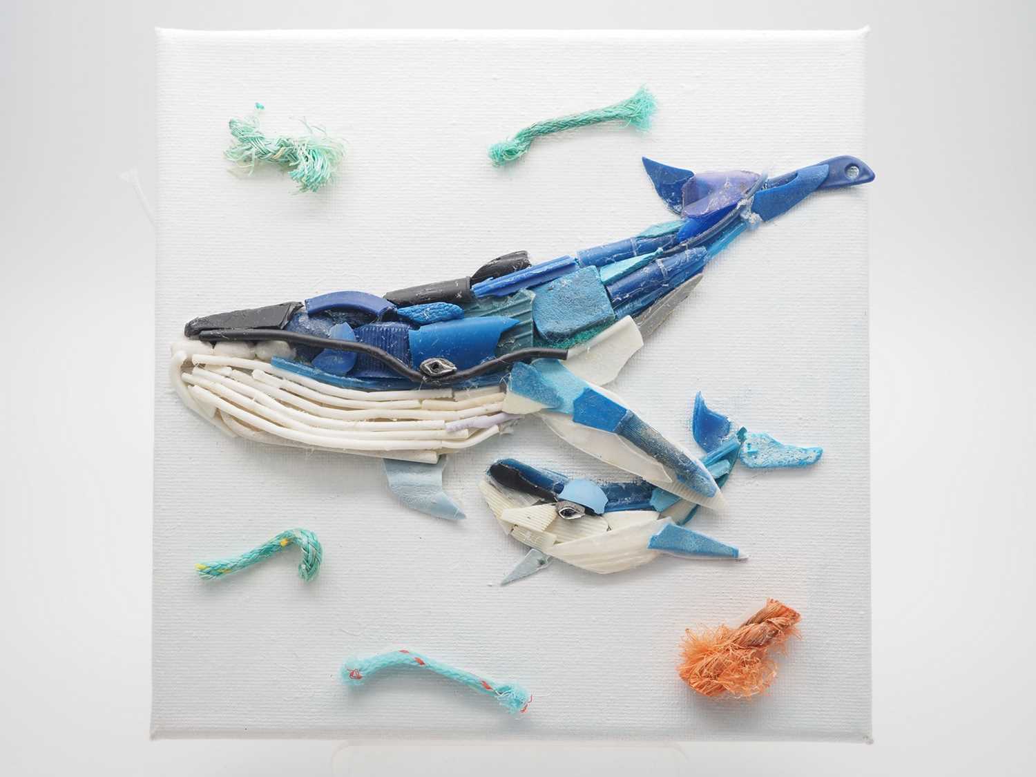 Emily Shaw -'CLEAN OUR SEAS' - created using litter found at sea on canvas - 8" x 8" - PROVENANCE: