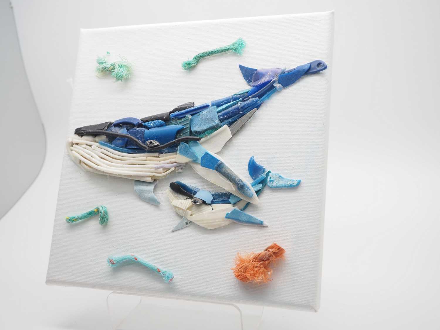 Emily Shaw -'CLEAN OUR SEAS' - created using litter found at sea on canvas - 8" x 8" - PROVENANCE: - Image 2 of 2