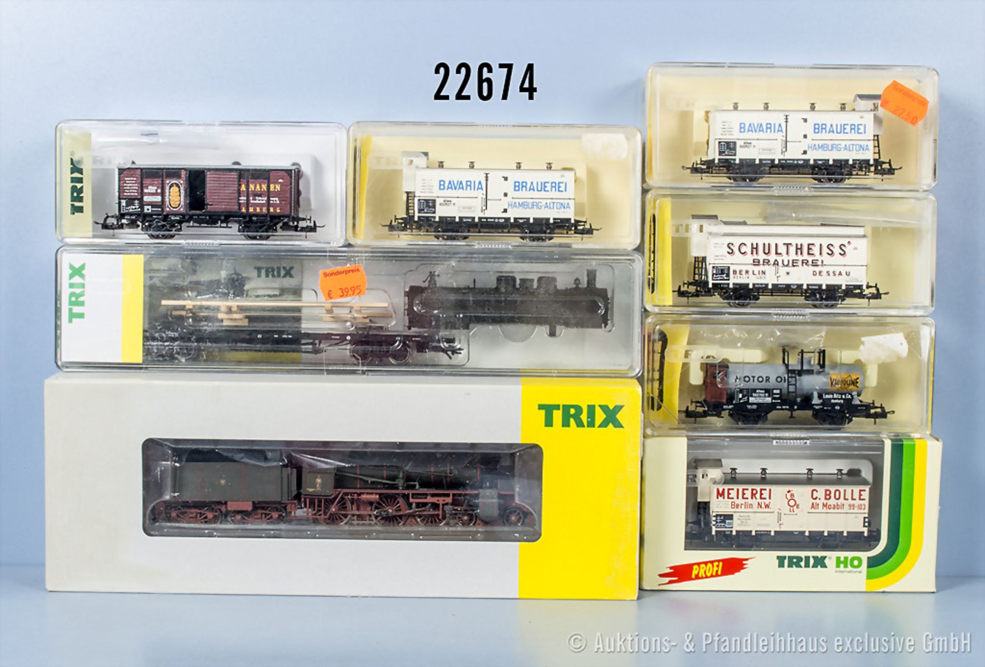 Trix International H0 Güterzug, dabei 22023 Schlepptenderlok der KPEV, BN 2458 mit ...