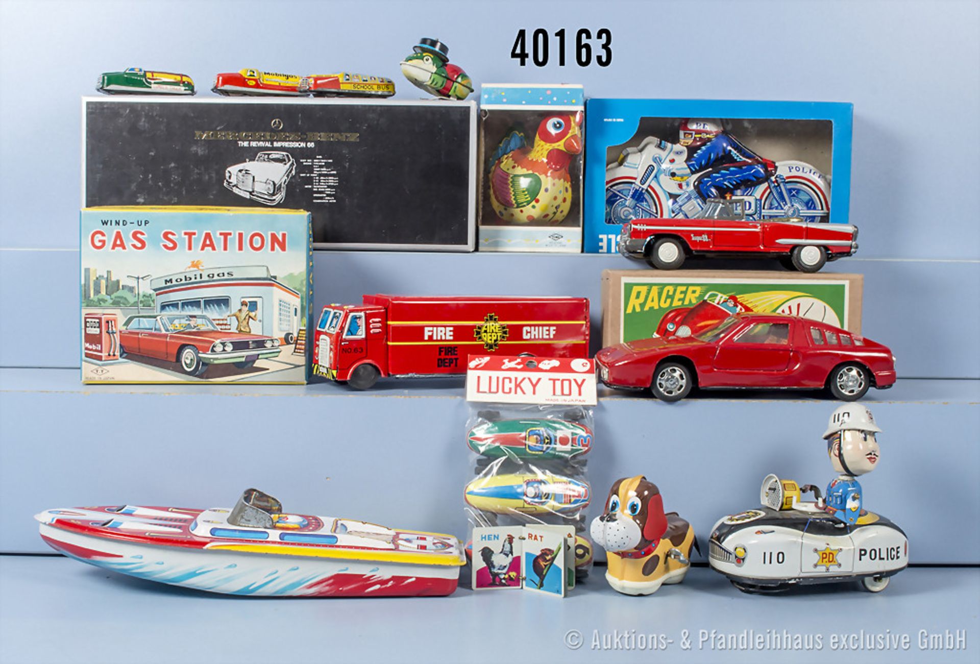 Konv. 15 Teile Blechspielzeug made in Japan, u.a. Wind Up Gas Station, Jumping Rooster, ...
