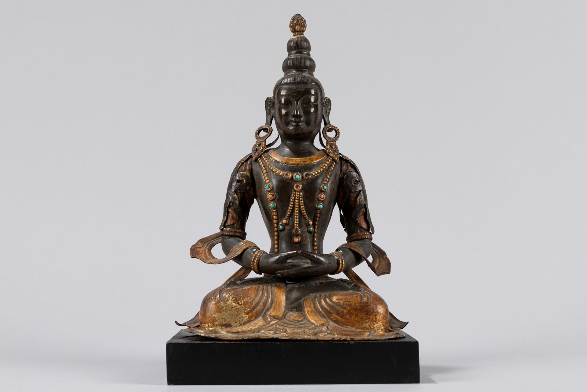 A gilt-lacquered repoussŽ Buddha. Mongolia, late 18th century