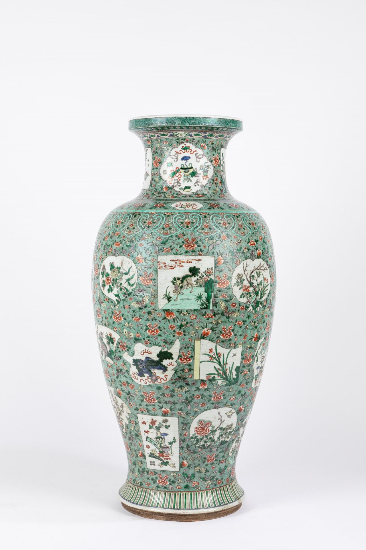 A large Famille Verte baluster vase. China, 19th century (defects)