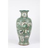 A large Famille Verte baluster vase. China, 19th century (defects)