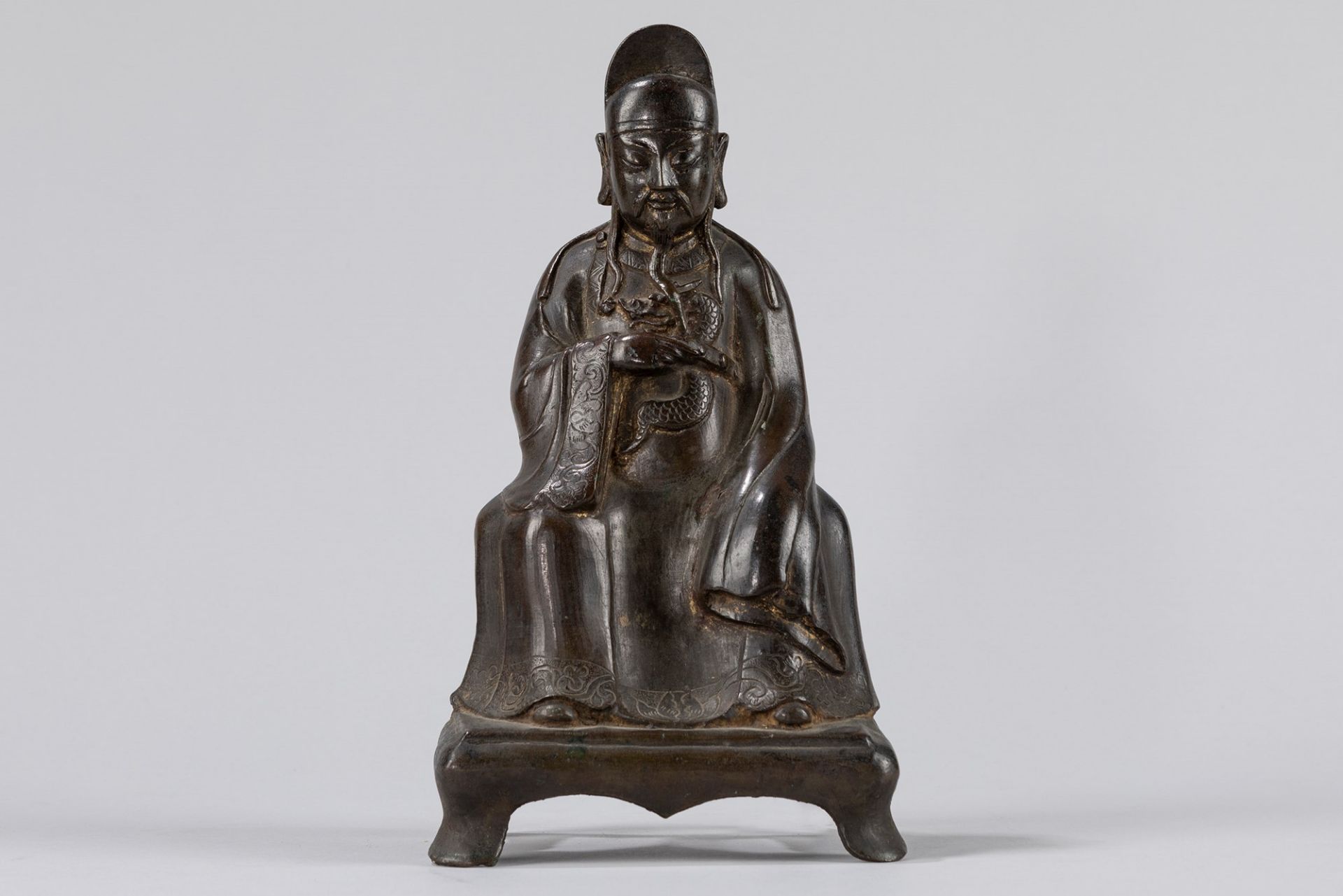 A part-gilt bronze figure. China, 17th century
