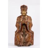 A carved wood taoist deity. China, Ming dynasty (1368-1644)
