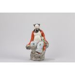 A polychrome porcelain figure of a wise man. China, Republic period (1912-1949)