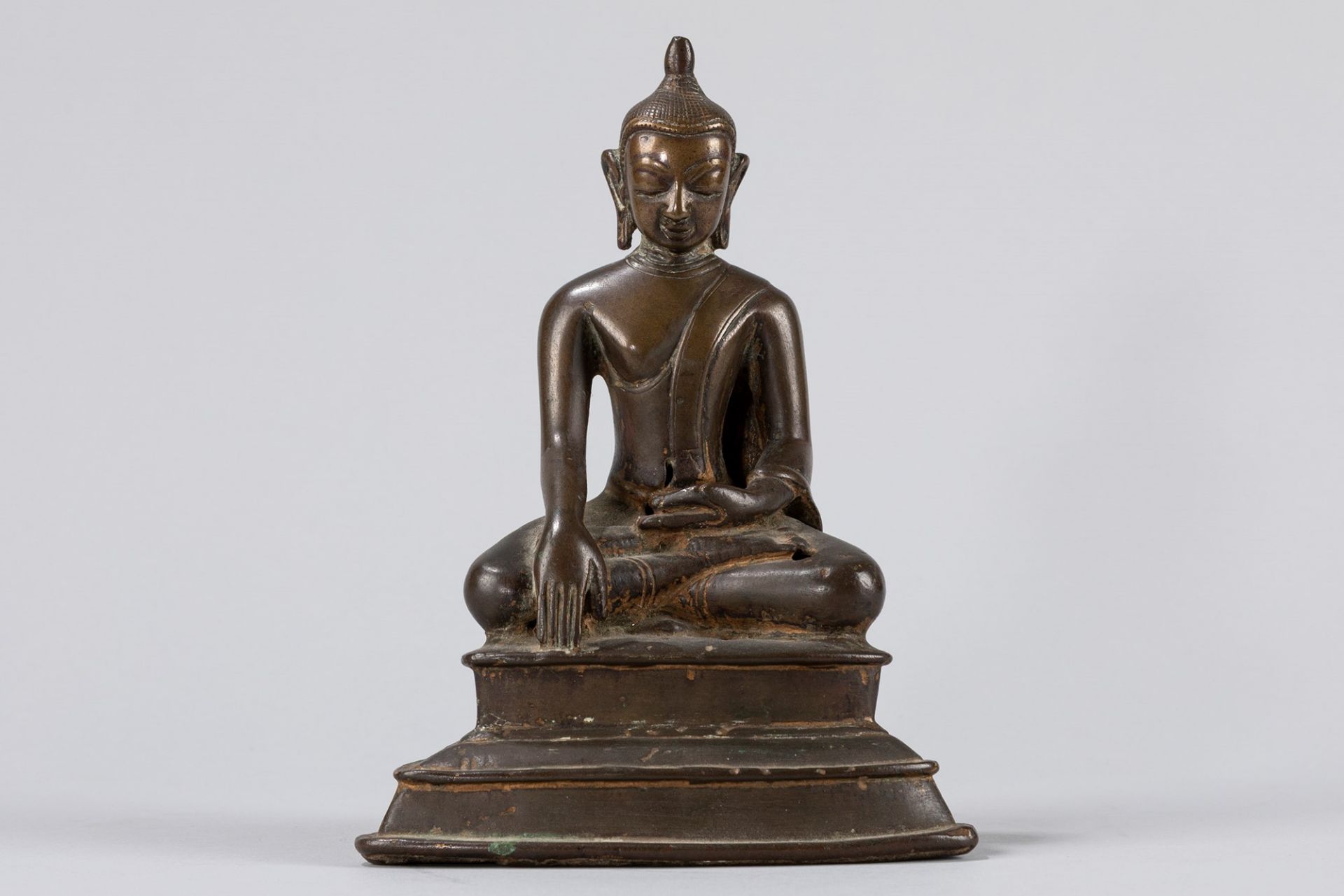 A bronze seated Buddha. South East Asia, 19th century