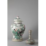 A famille Rose porcelain vase and a millefleur-ground vase. China, 19th/20th century