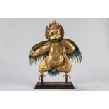 An embossed gilt copper Garuda. Tibet, 19th century