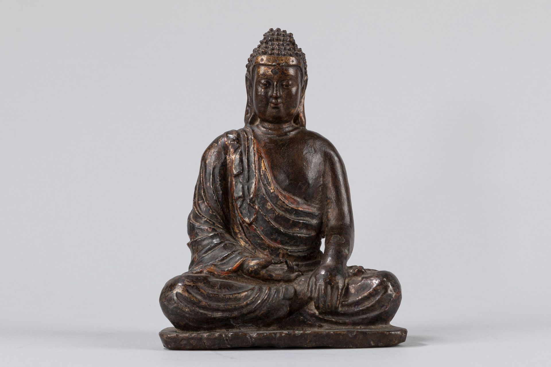 A seated bronze Buddha. South East Asia, 19th century