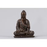 A seated bronze Buddha. South East Asia, 19th century