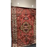 Persian rug of reds and browns