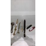 job lot of letter openers and penknifes .