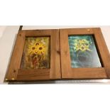 Two prints in heavy oak frames