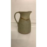 Glazed pottery jug grey with speckles