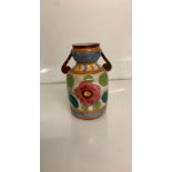 Studio pottery vase, multi coloured with flowers signed underneath