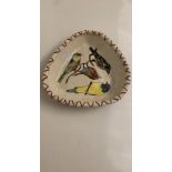 Studio pottery dish depicting birds signed H.W.