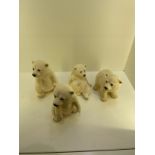 4 small polar bears