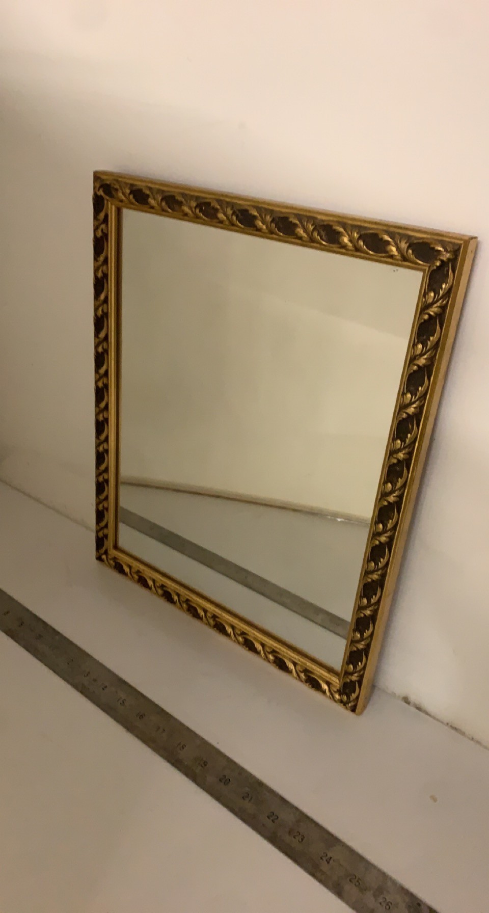 Small gold framed mirror