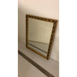 Small gold framed mirror