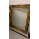 large gold framed mirror