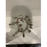 Silver braclet and 15 charms