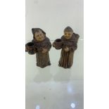 Two stoneware monk match holders