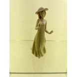 Nao Figurine 1991 of a lady in green dress