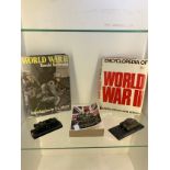 War books with two miniture tanks