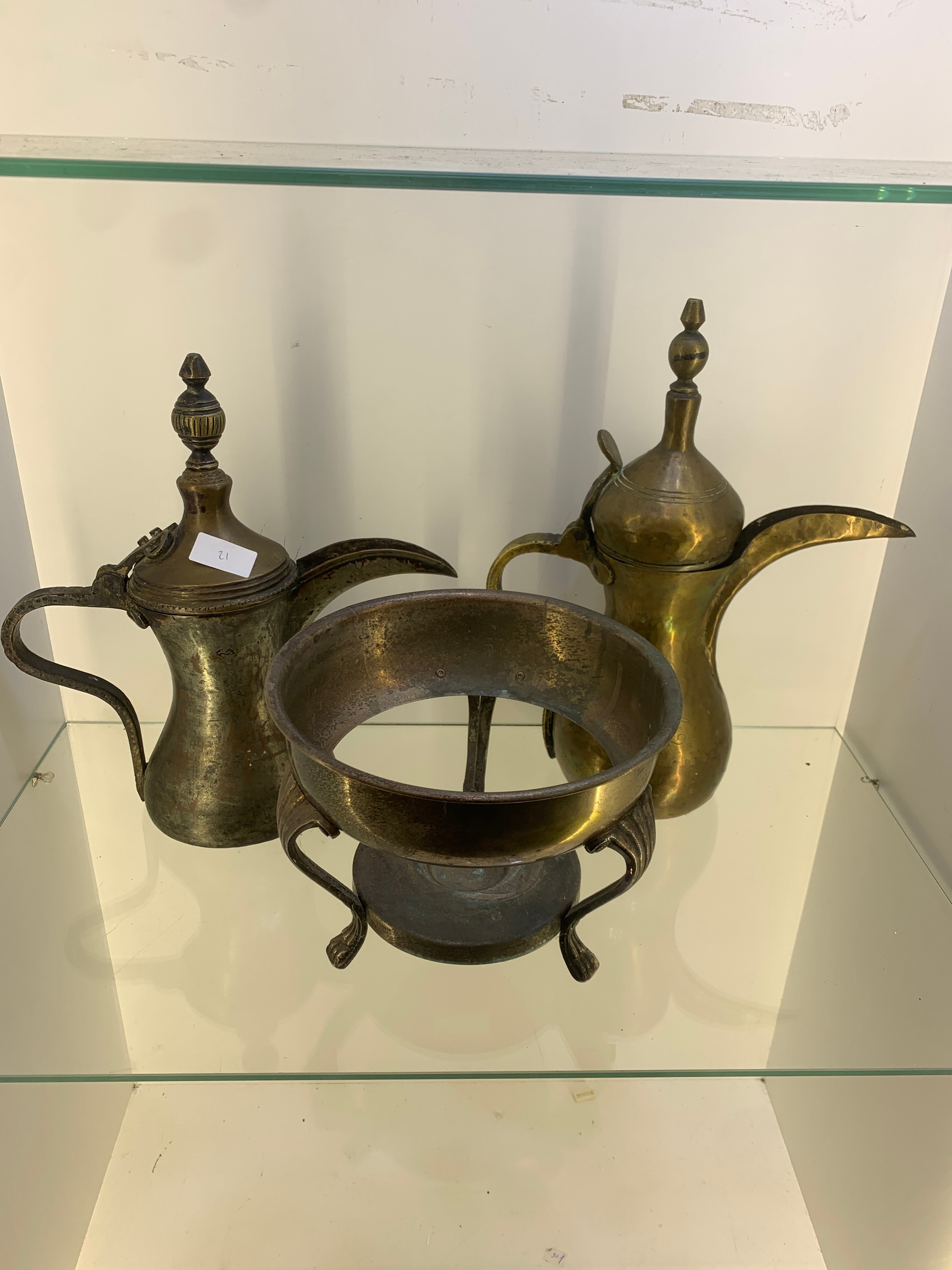 2 antique brass coffee pots saudi arbia and middle eastand a silver champange bucket holder