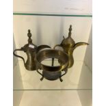 2 antique brass coffee pots saudi arbia and middle eastand a silver champange bucket holder