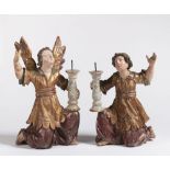 A Pair of Provincial Angel Candlesticks, 17th century