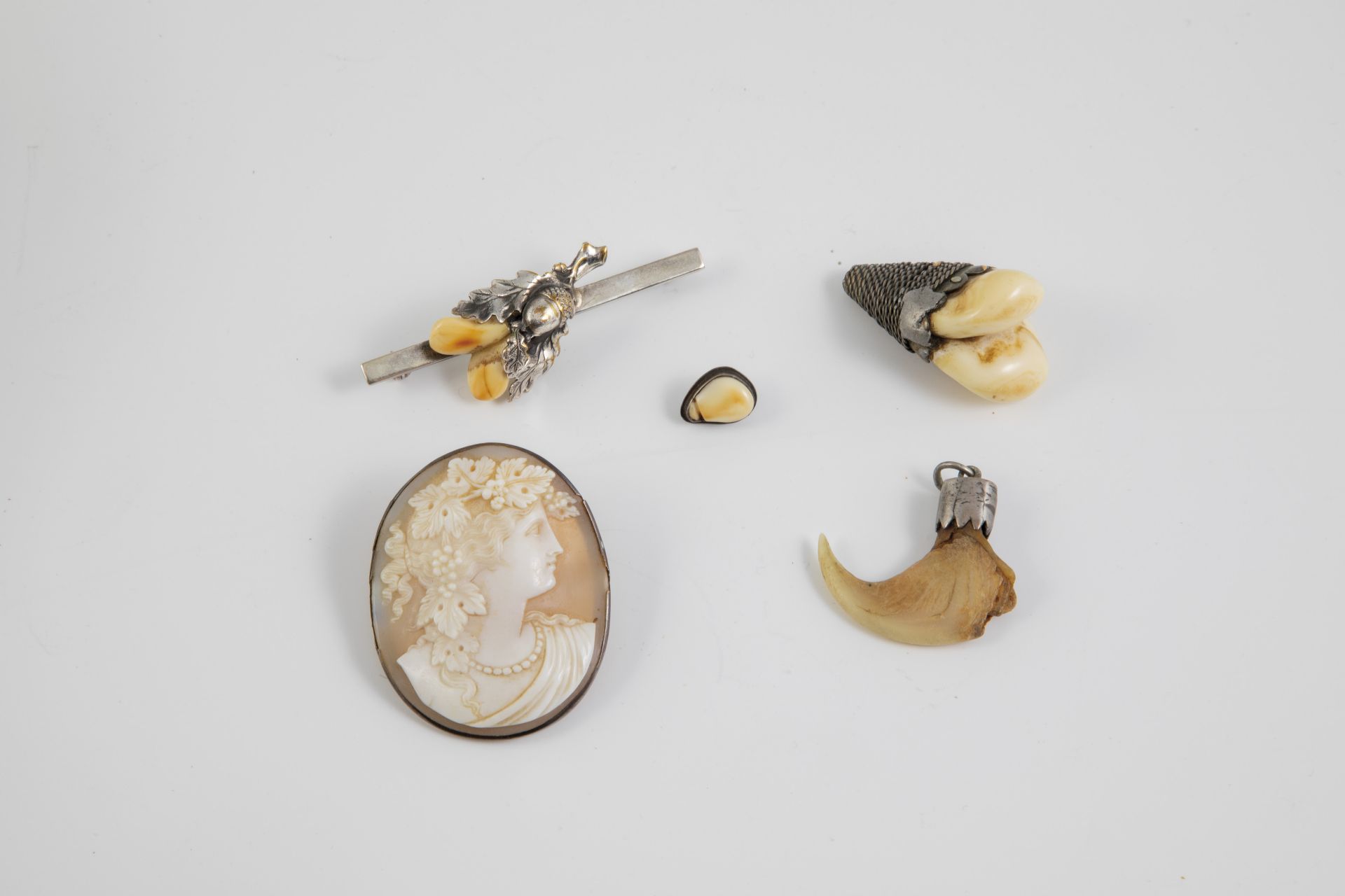 Four piece hunting set with grands and cameo brooch