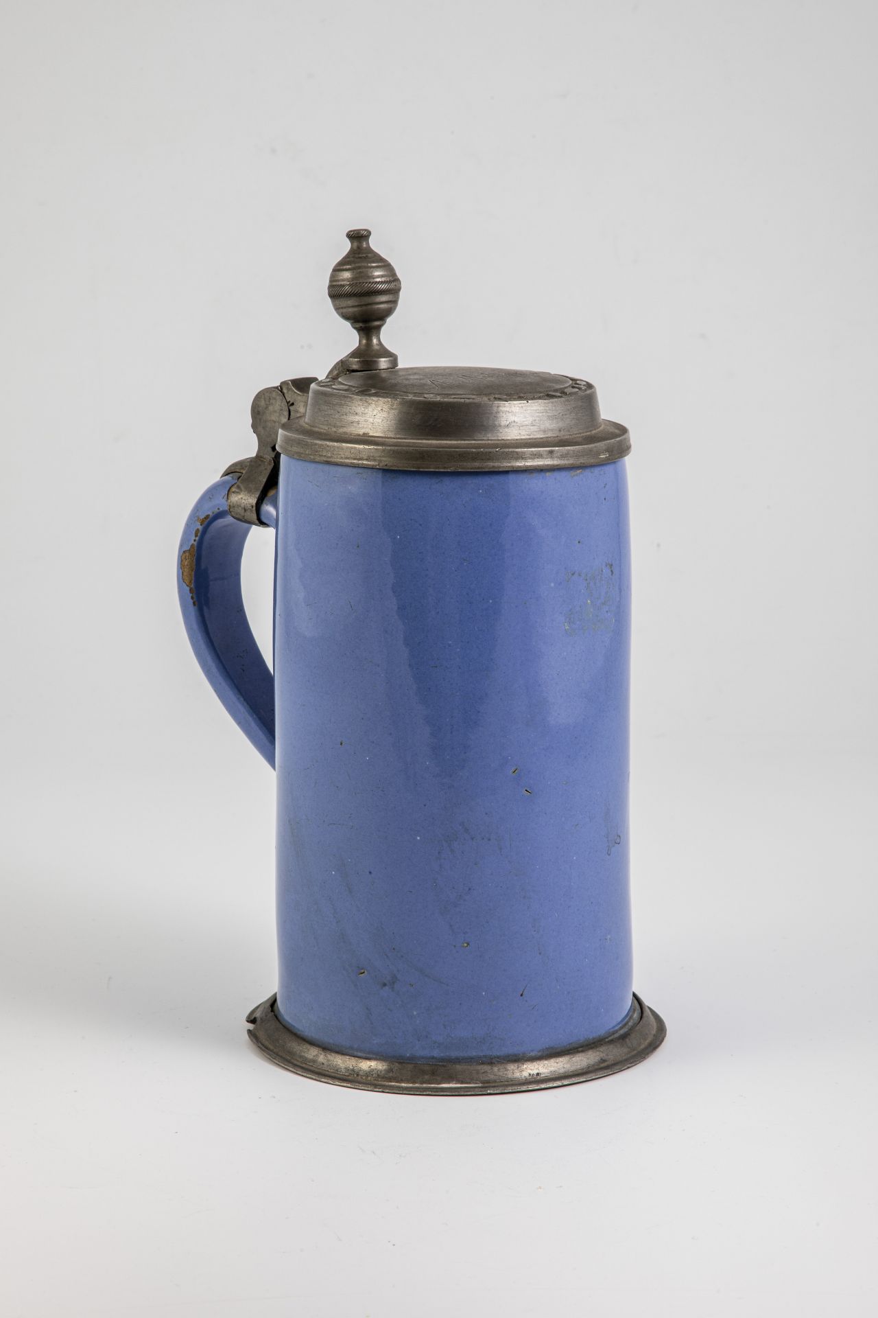 Faience jug with pewter mounting