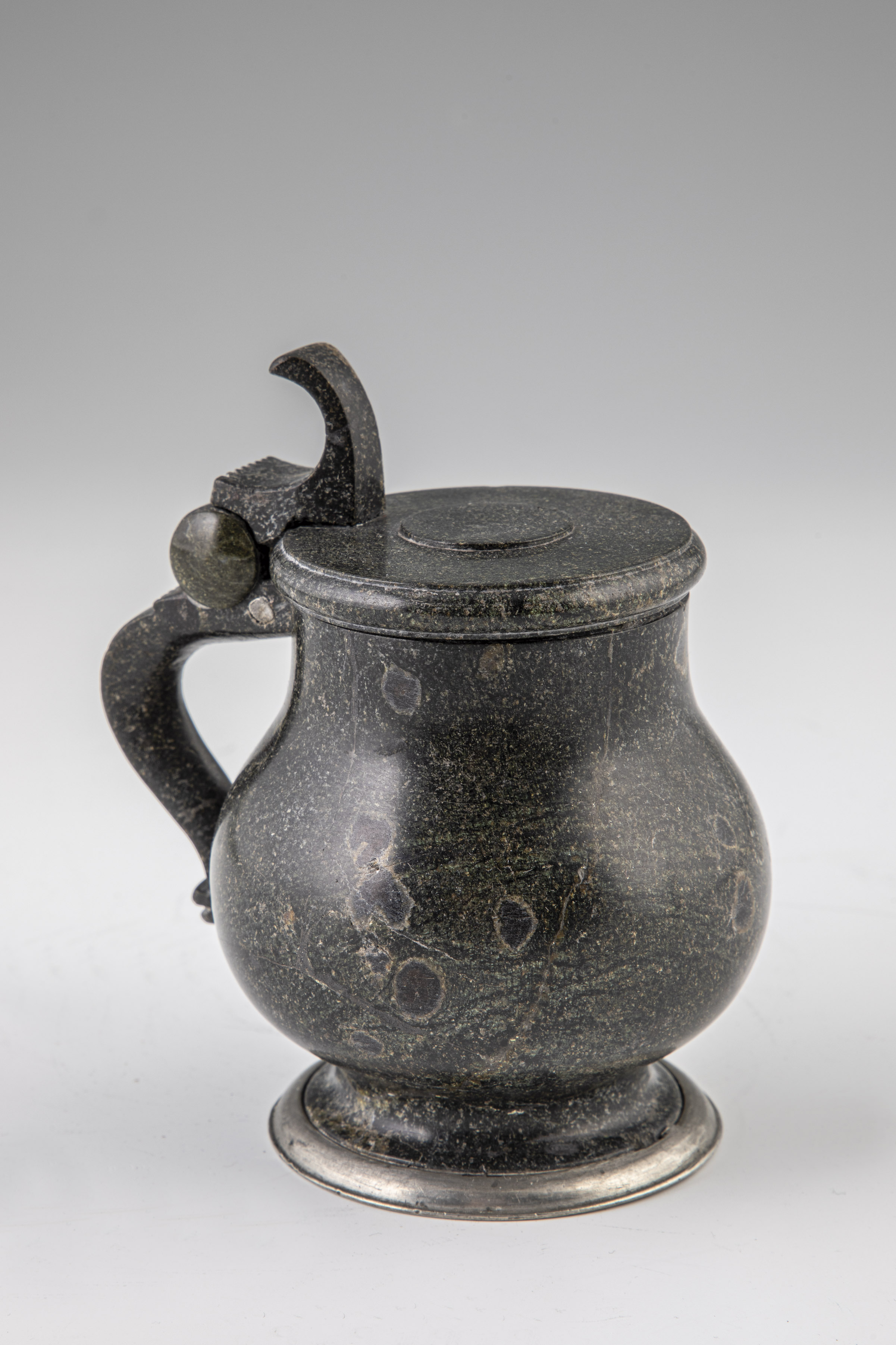 Small spherical belly jug made of serpentine