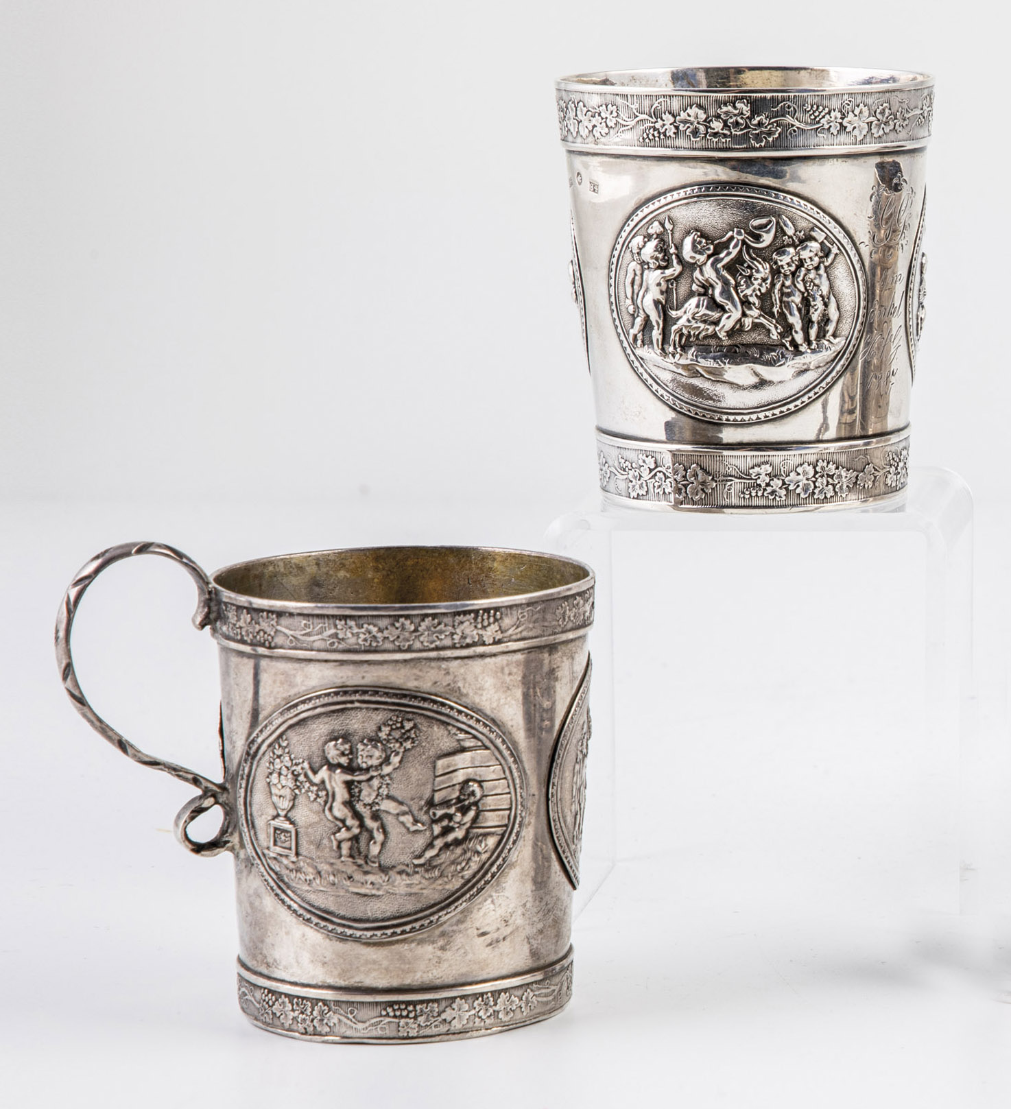 Mug and handle mug with putti