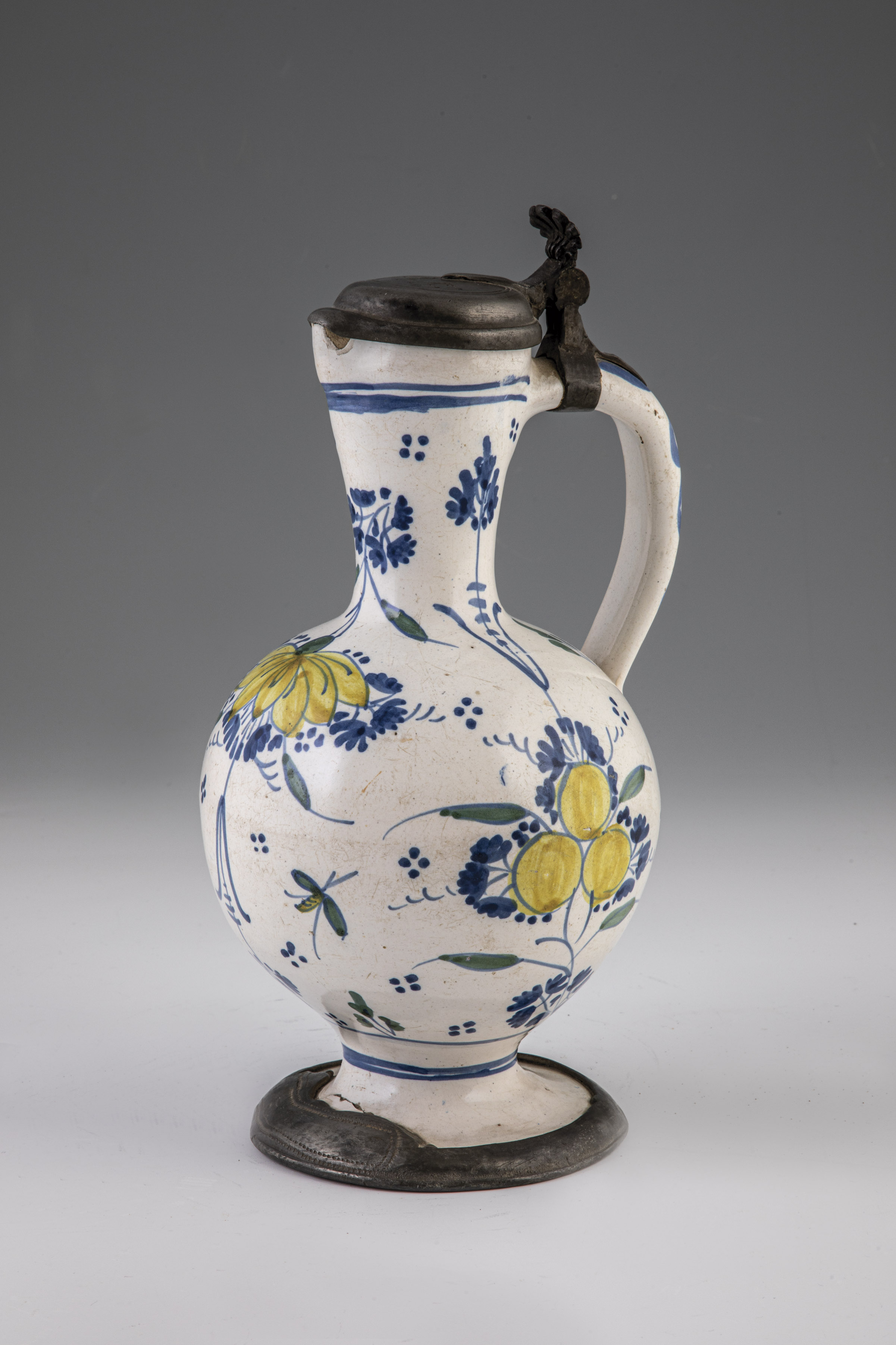 Narrow neck jug with flower branches and insects