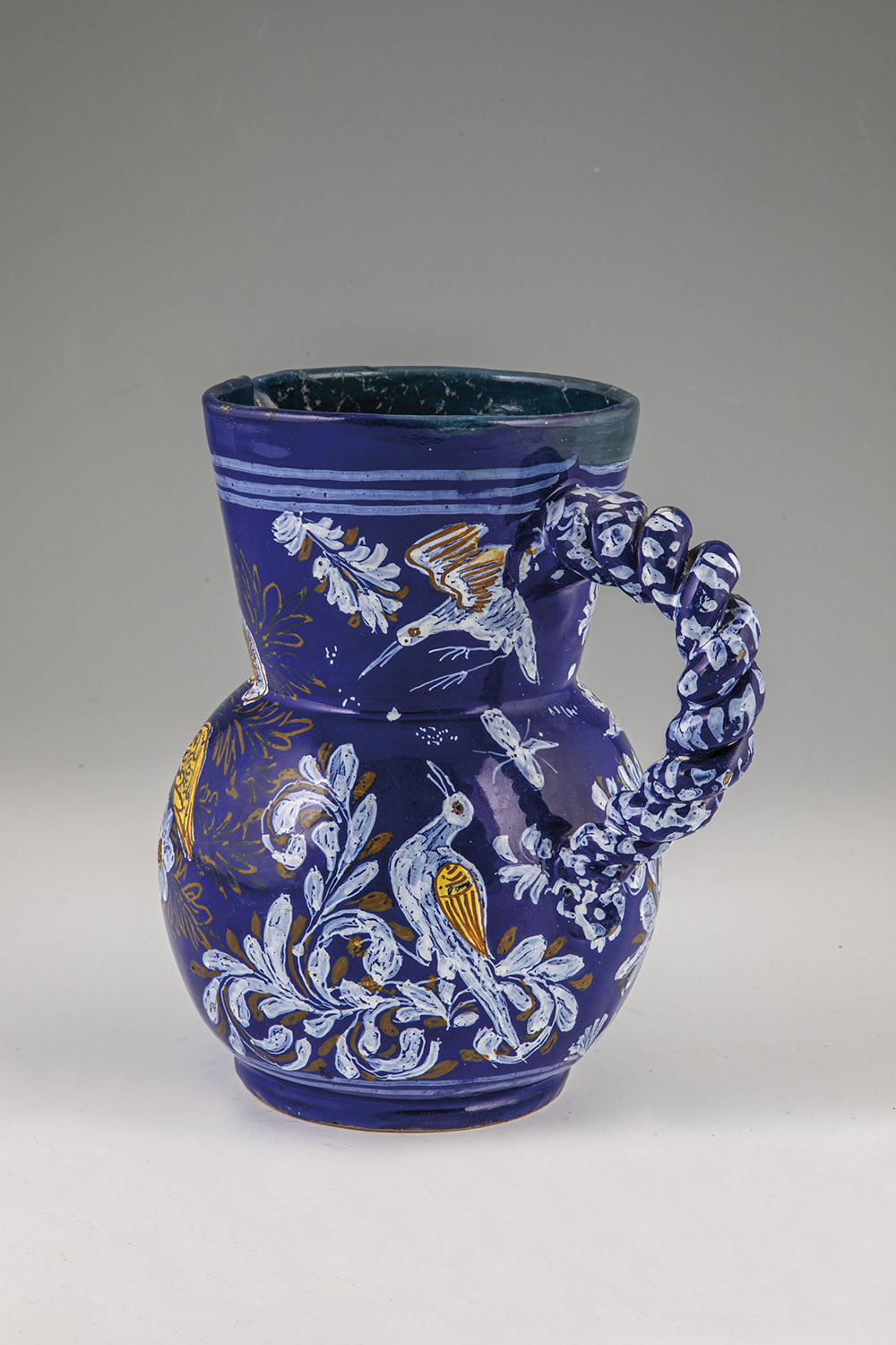 Rare jug with handle with birds and insects