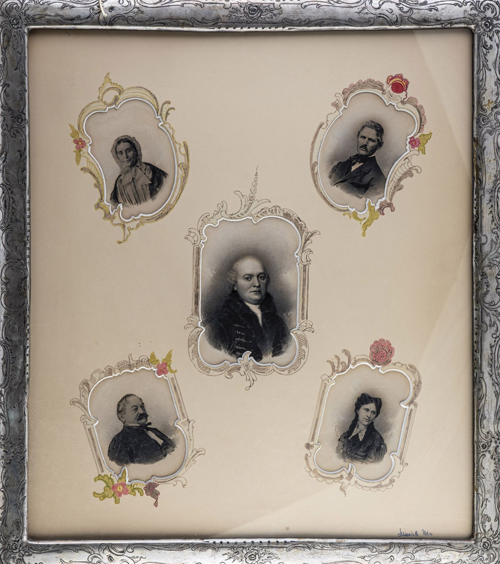 Large picture frame with family portraits