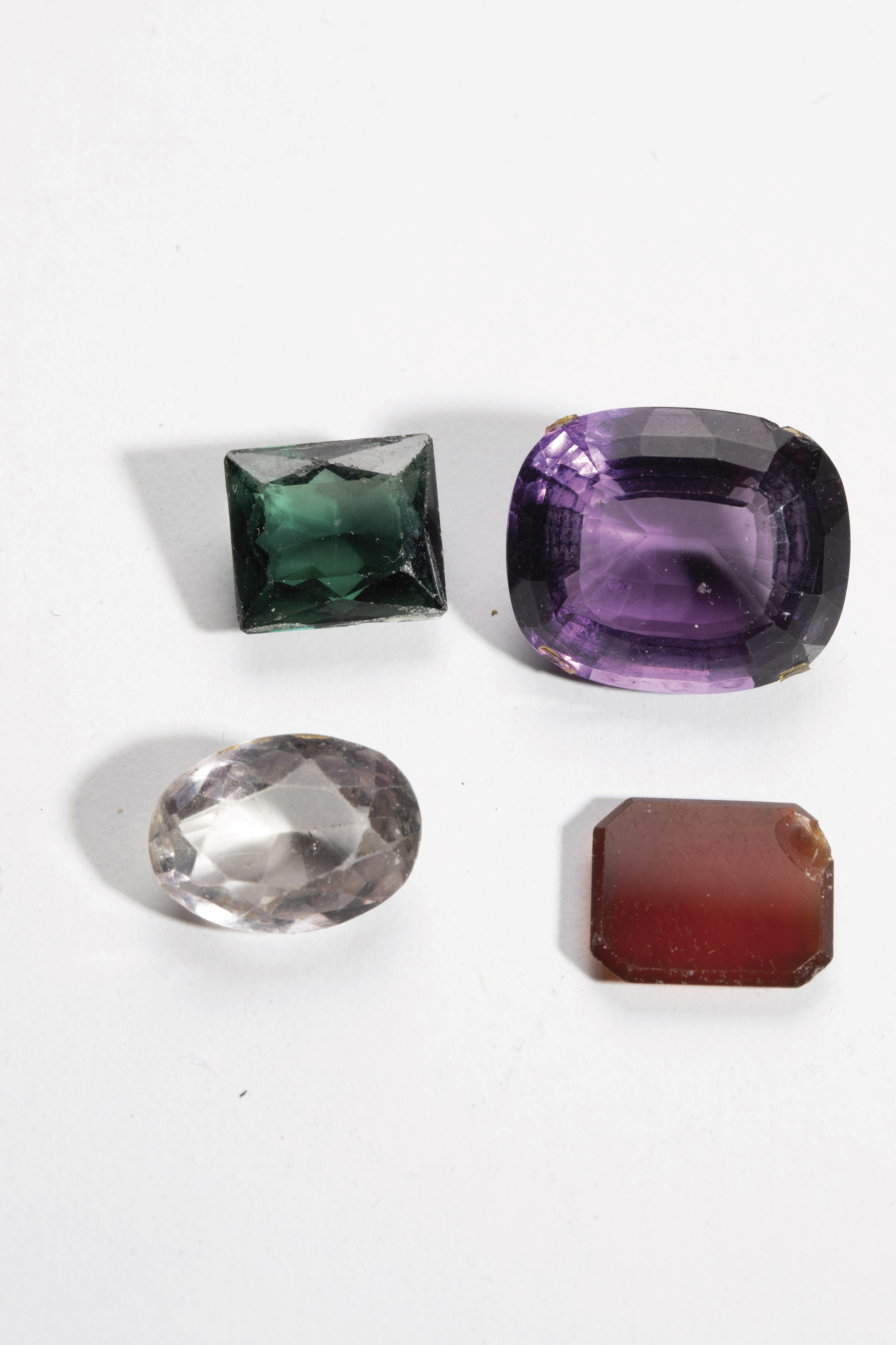 Four unmounted gemstones